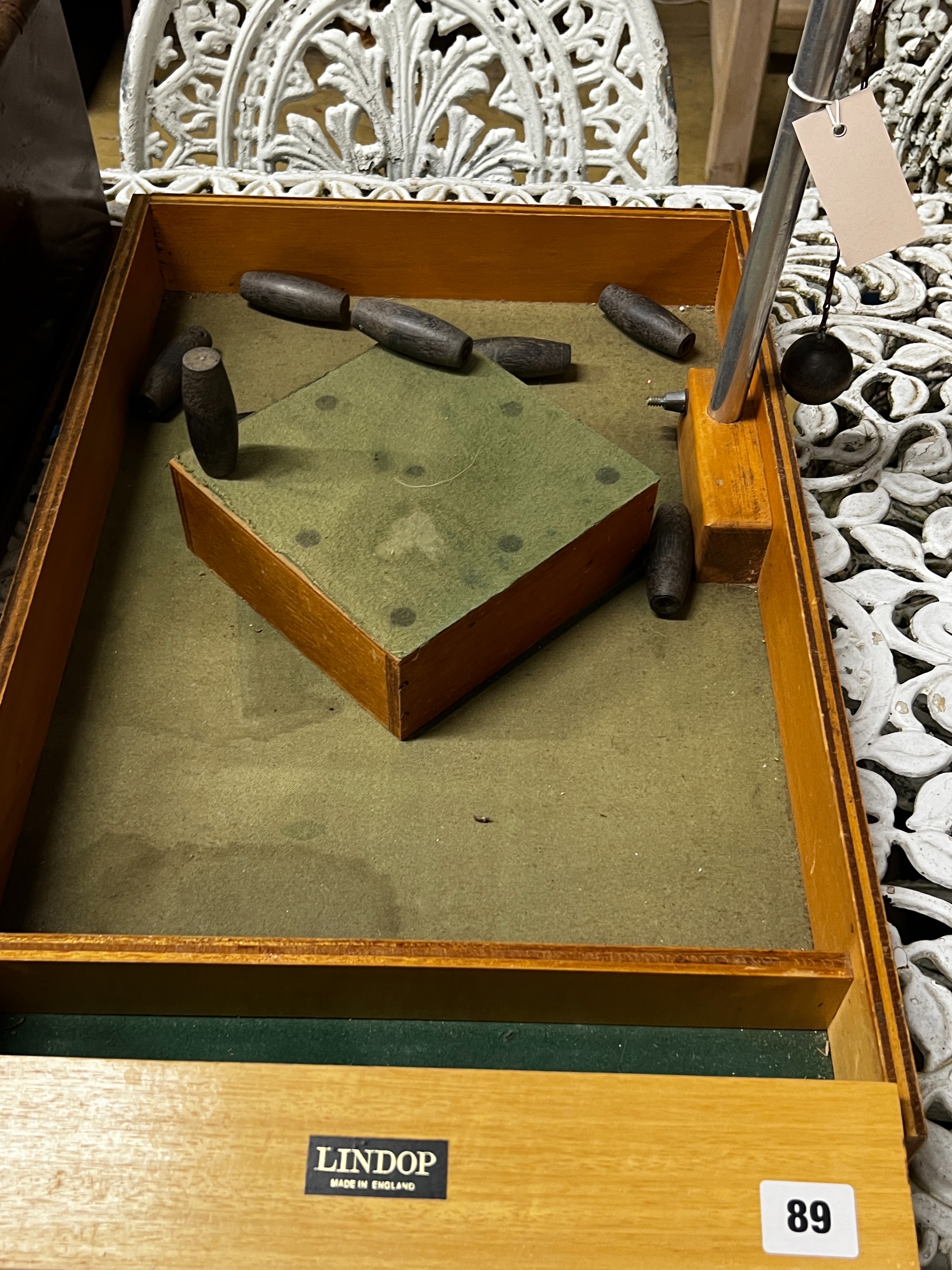 A vintage Lindop table skittles game and a Victorian mahogany till